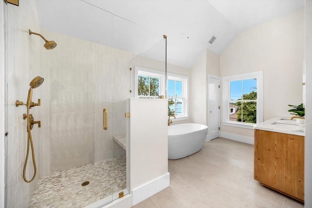 34 Otis Hill Road Hingham, MA 02043 - Photo 23 of 42 a bathroom with a tub shower and window