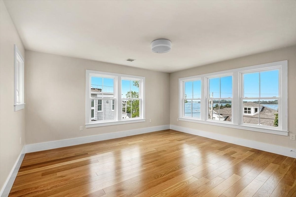 34 Otis Hill Road Hingham, MA 02043 - Photo 26 of 42 a view of an empty room with a window