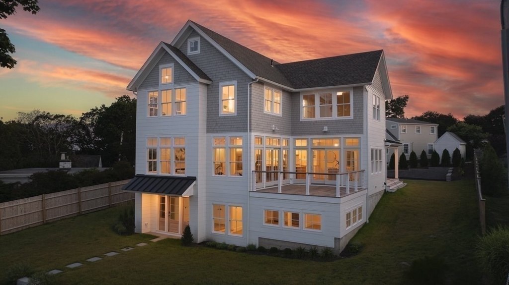 34 Otis Hill Road Hingham, MA 02043 - Photo 3 of 42 a front view of a house with a yard