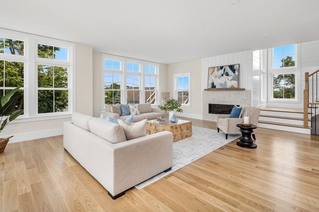 34 Otis Hill Road Hingham, MA 02043 - Photo 4 of 42 a living room with furniture and a fireplace