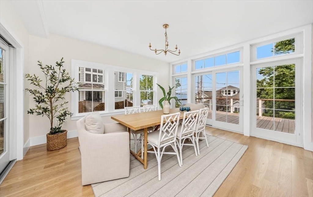 34 Otis Hill Road Hingham, MA 02043 - Photo 7 of 42 a view of a dining room with furniture window and wooden floor
