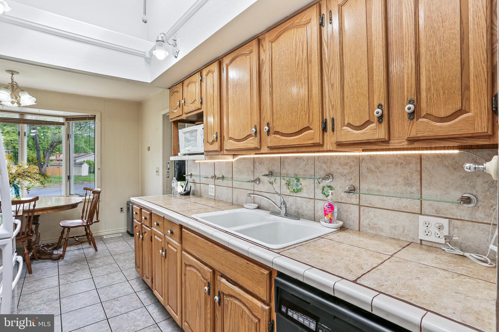 3035 Tarpon Road Riva, MD 21140 - Photo 8 of 31 a kitchen with a sink and cabinets