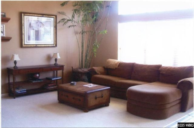 1525 Diamond Country Drive Reno, NV 89521 - Photo 3 of 6 a living room with furniture and a table
