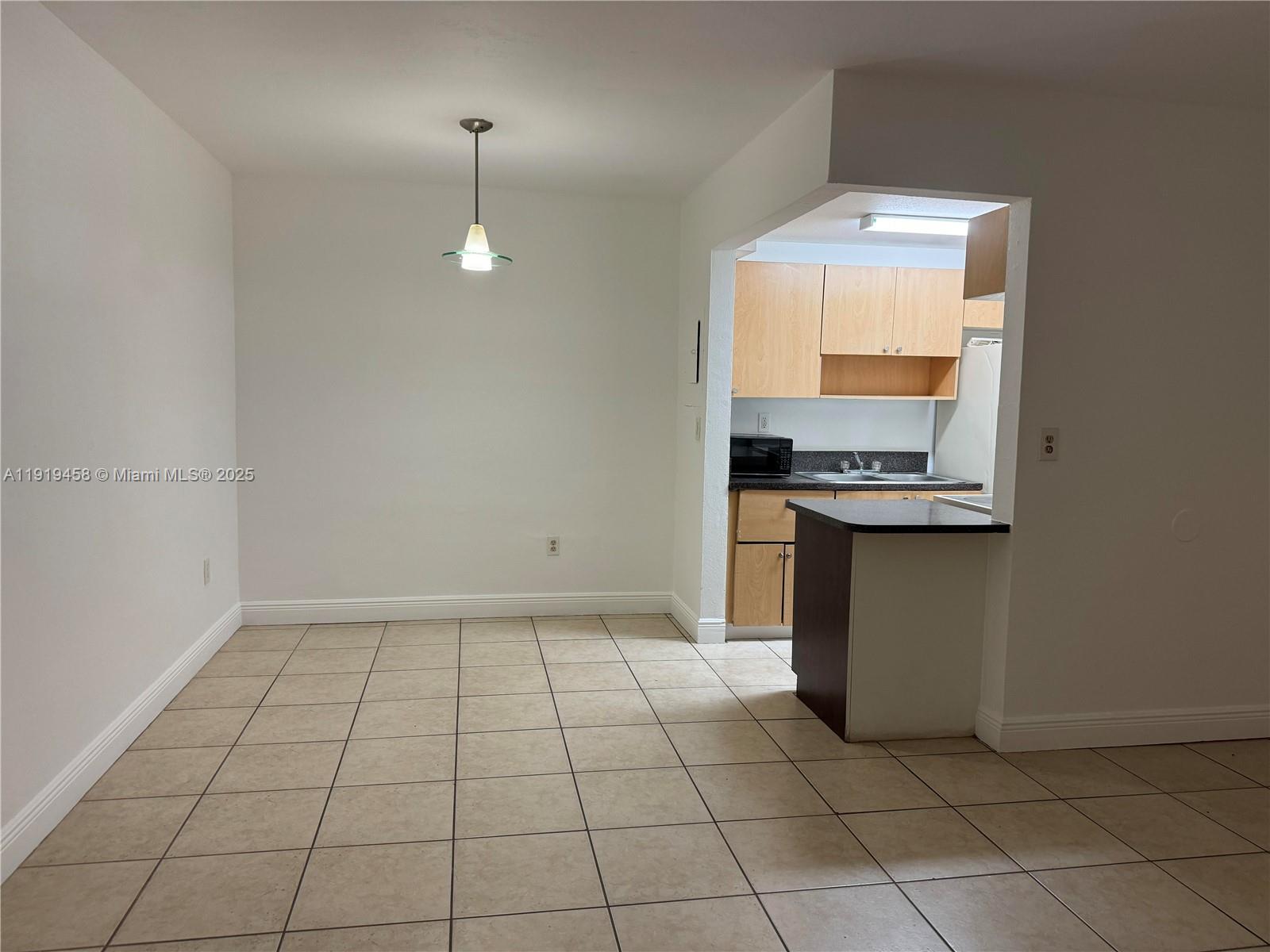 1851 Northeast 168th Street, Unit A2 North Miami Beach, FL 33162 - Photo 7 of 30