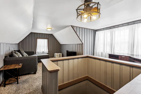 a view of a livingroom with furniture and window