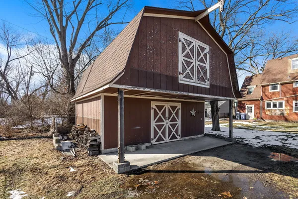 a sign on a pole on a street