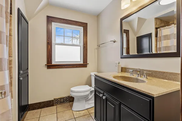 a bathroom with a sink and a toilet