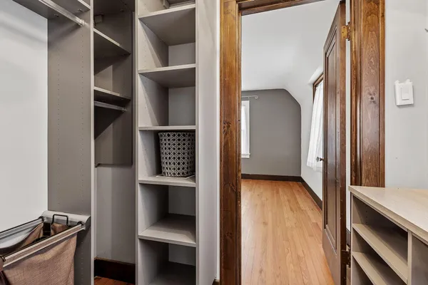 a view of an empty room and fire place