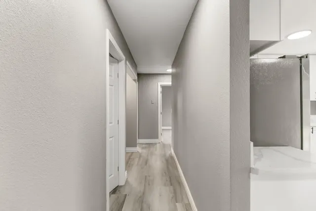 a view of hallway with stairs