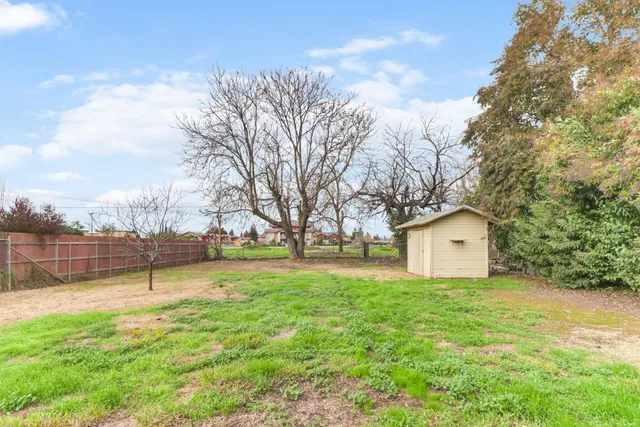 a view of a backyard with a garden