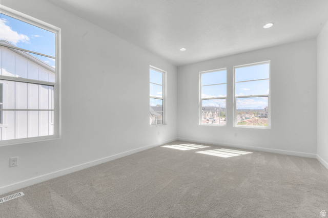 3204 West 1570 North Provo, UT 84601 - Photo 16 of 19 Carpeted empty room with baseboards and recessed lighting