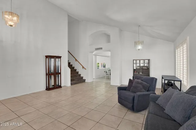 a living room with furniture and a couch