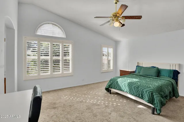 a very nice looking dining room with a large window