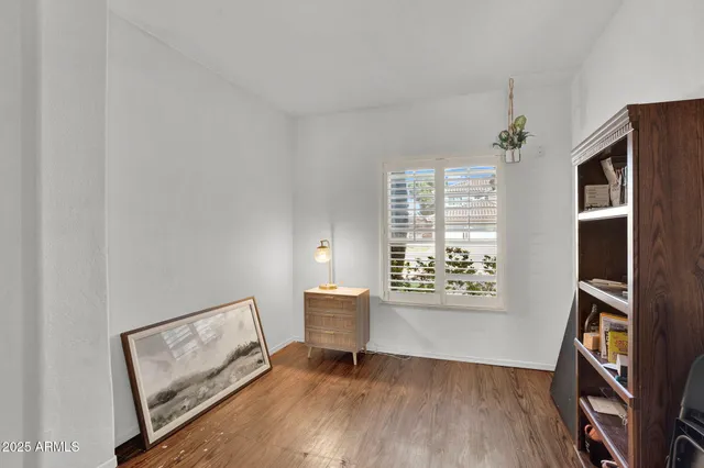 a white bath tub sitting next to a window
