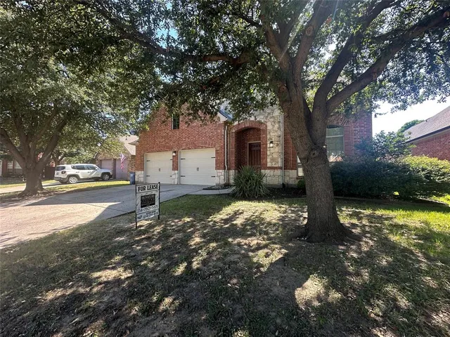 a view of backyard with green space
