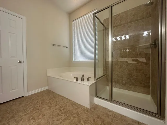 a bathroom with a sink vanity and mirror