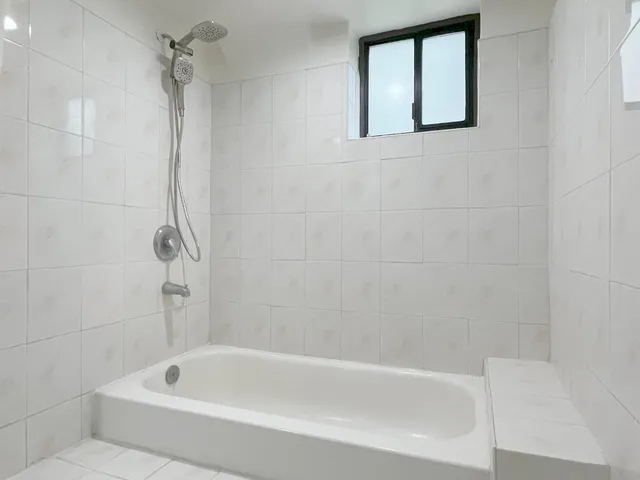 a bathroom with a bathtub