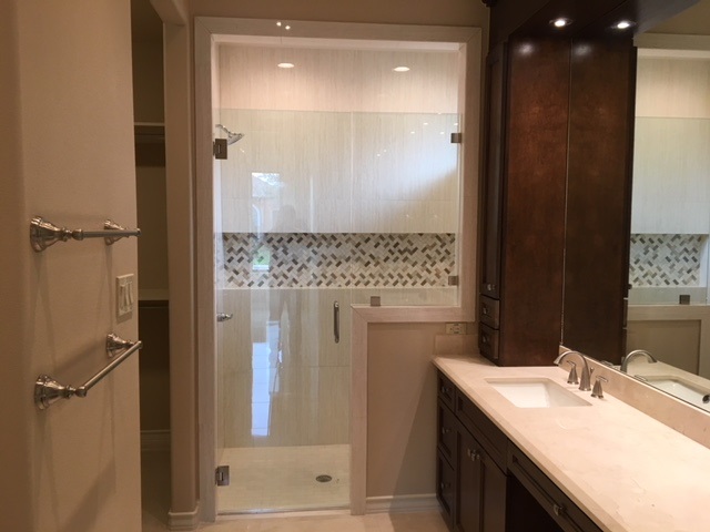 10819 Marfa Road Laredo, TX 78045 - Photo 11 of 17 a bathroom with a granite countertop sink mirror and shower