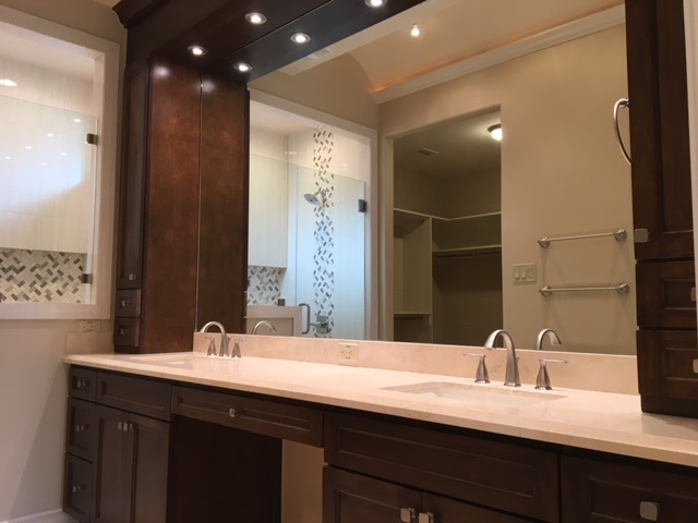 10819 Marfa Road Laredo, TX 78045 - Photo 12 of 17 a bathroom with a double vanity sink and a mirror