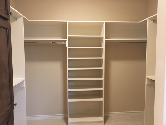10819 Marfa Road Laredo, TX 78045 - Photo 13 of 17 a view of walk in closet with empty racks