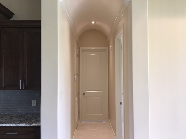10819 Marfa Road Laredo, TX 78045 - Photo 15 of 17 a view of a hallway with closet and a bathroom
