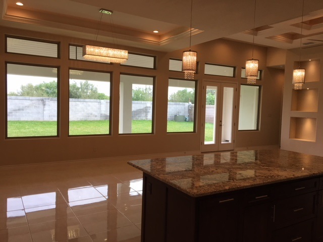 10819 Marfa Road Laredo, TX 78045 - Photo 9 of 17 a kitchen with a sink and large window