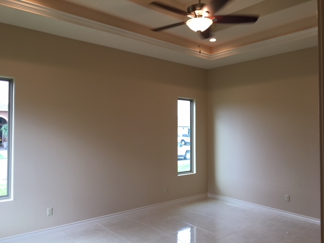 10819 Marfa Road Laredo, TX 78045 - Photo 10 of 17 a view of livingroom with window ceiling fan and window
