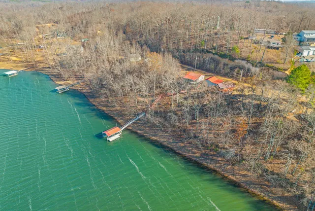 a living room with furniture fireplace and flat screen tv