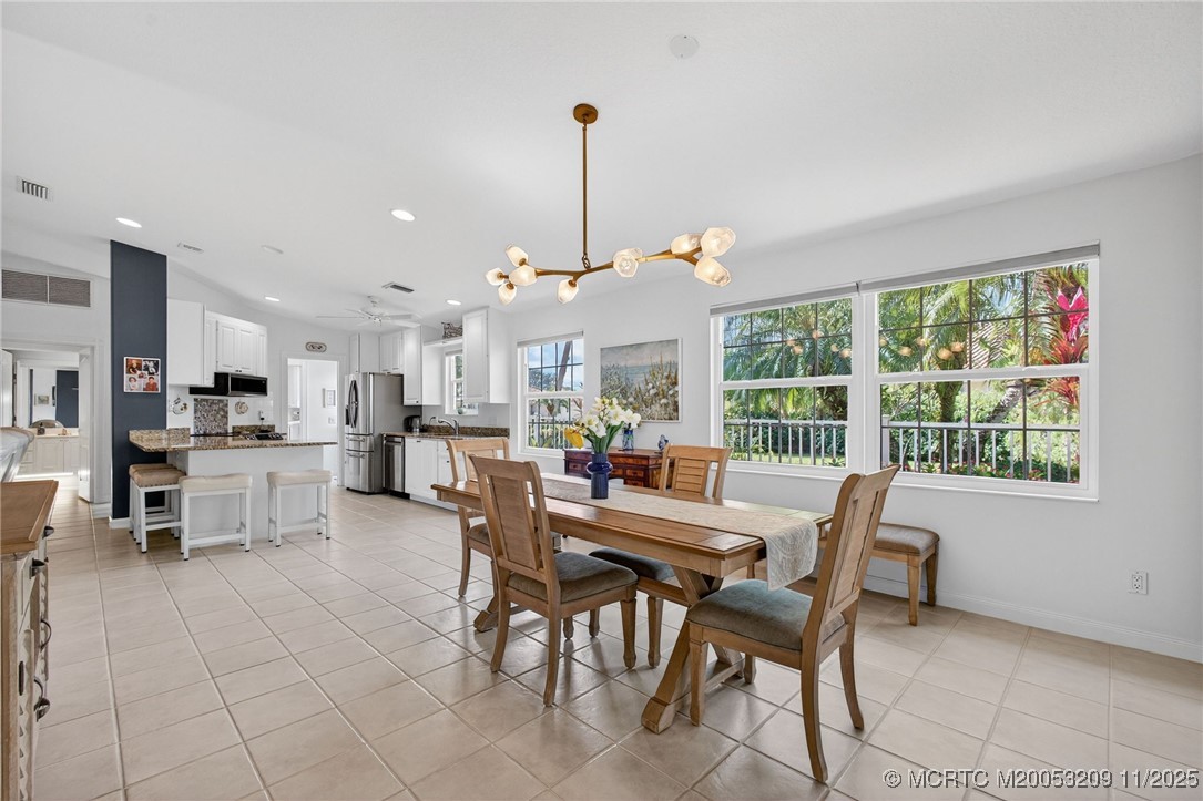 1035 Southwest Tamarrow Place Stuart, FL 34997 - Photo 7 of 46 Designer light fixture adds to the ambiance