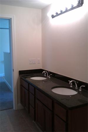 83 Massasoit Road Worcester, MA 01604 - Photo 6 of 10 a bathroom with a sink and a mirror