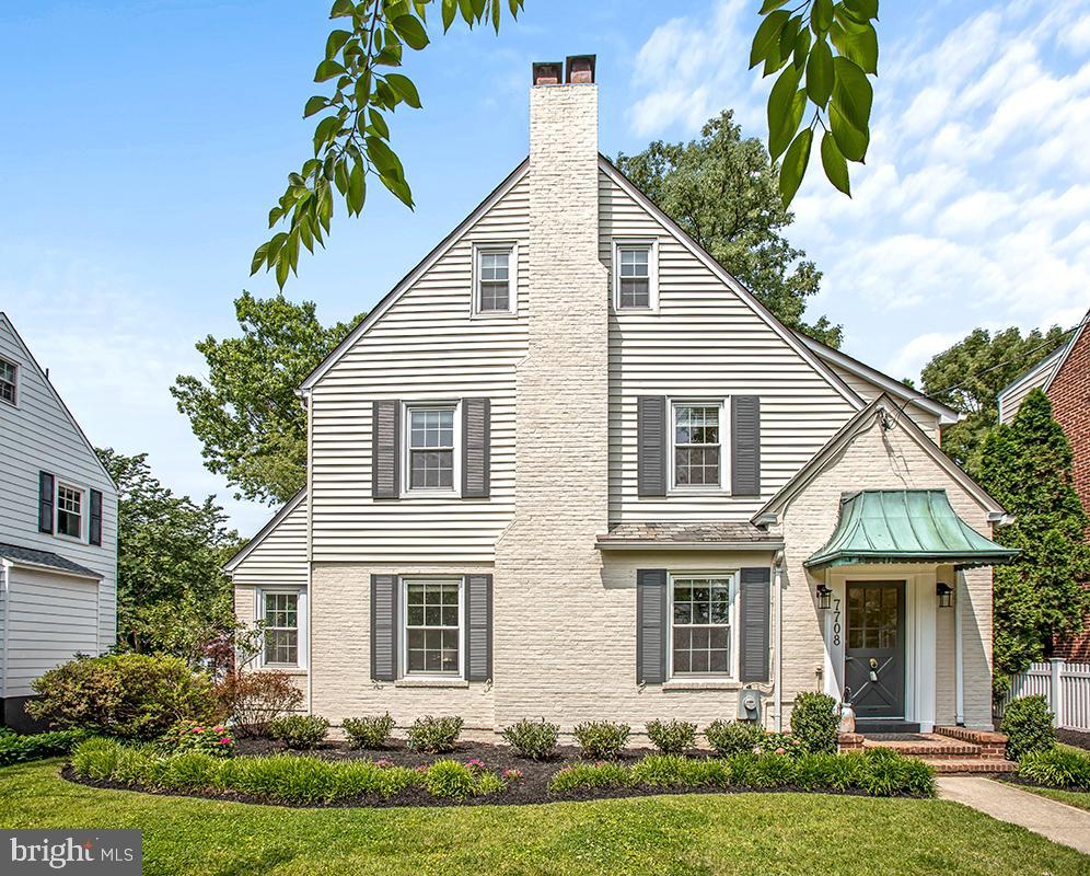 7708 Meadow Lane Chevy Chase, MD 20815 - Photo 1 of 26 a view of a house with a yard