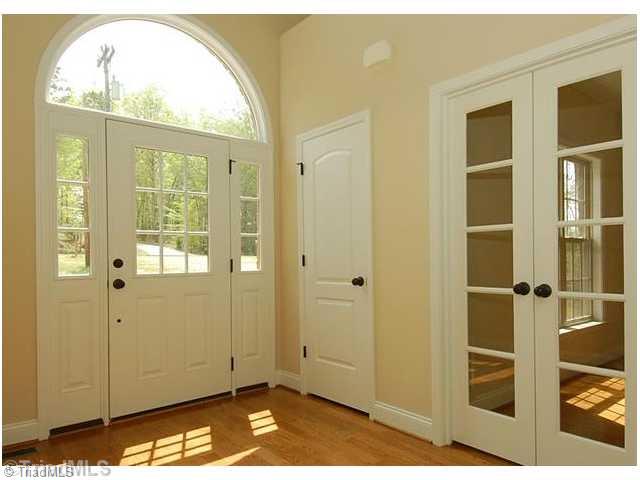931 Williams Road Lewisville, NC 27023 - Photo 3 of 15 Entry. 2 story entry with french doors leading to living room/office/study