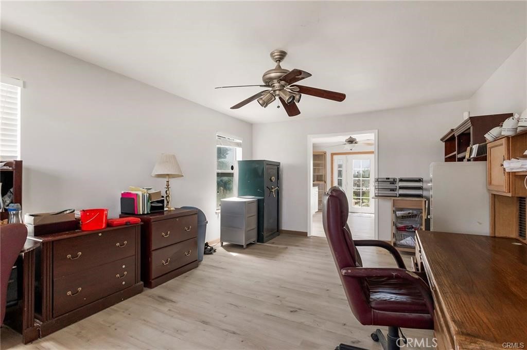 22085 Finnell Avenue Corning, CA 96021 - Photo 35 of 68 a view of a workspace with furniture and a window
