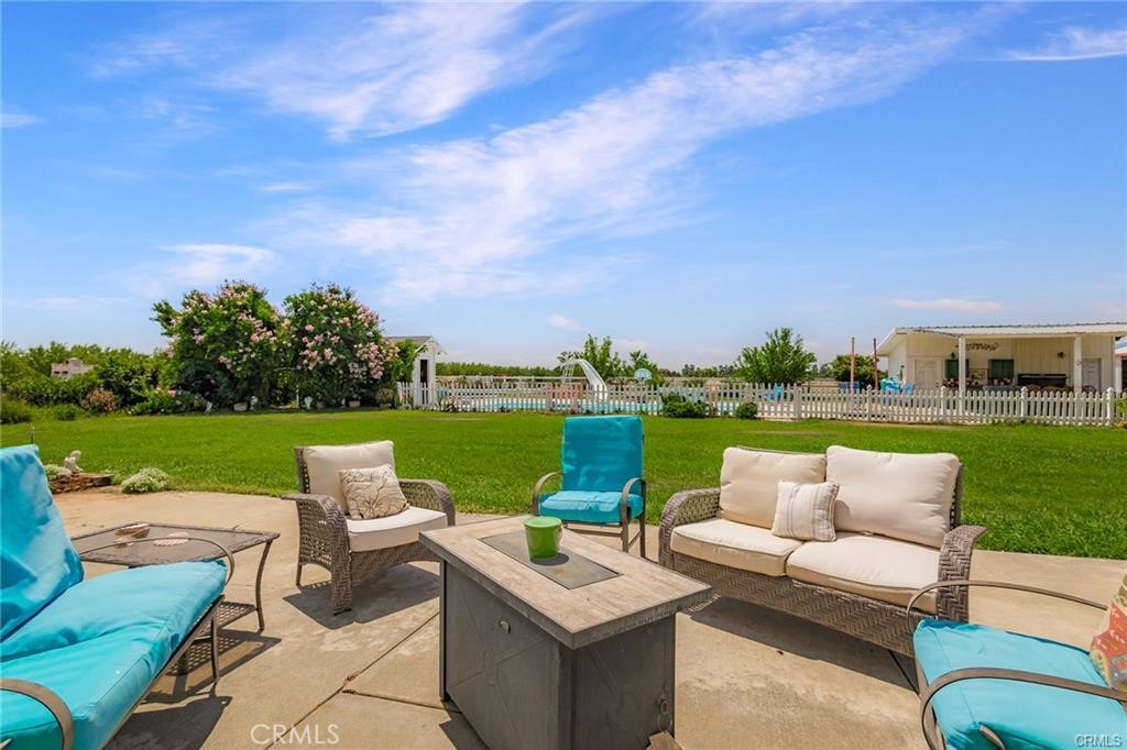 22085 Finnell Avenue Corning, CA 96021 - Photo 9 of 68 a view of a garden with couches in a park
