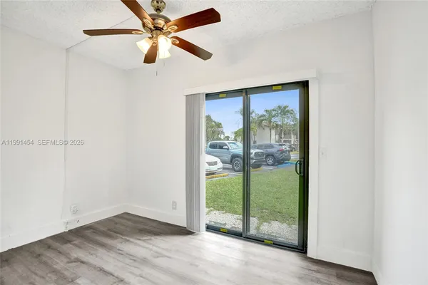 an empty room with fan