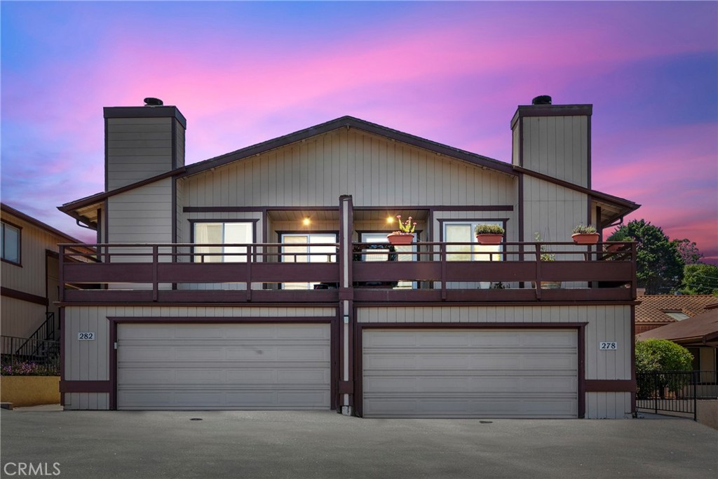 282 Robles Road, Unit 19 Arroyo Grande, CA 93420 - Photo 24 of 24 a front view of a house with a garage