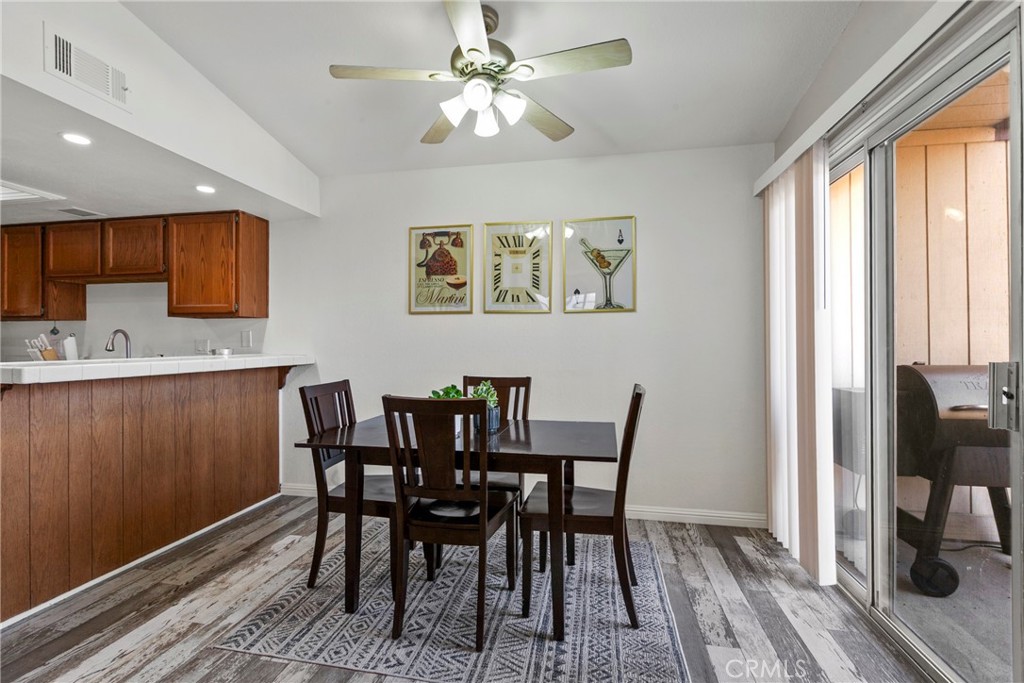 282 Robles Road, Unit 19 Arroyo Grande, CA 93420 - Photo 5 of 24 a view of a dining room with furniture window and outside view