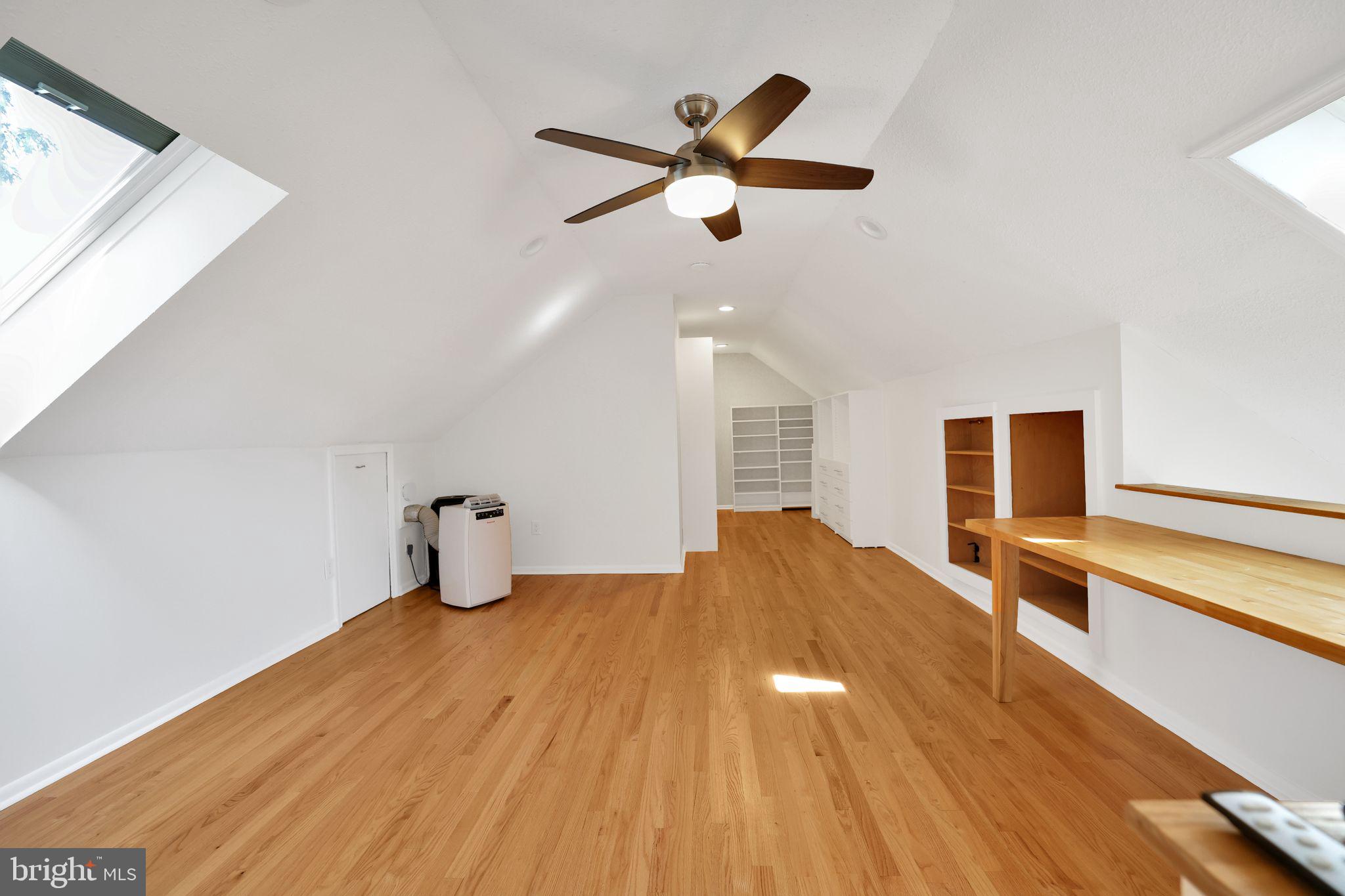 2312 Colston Drive, Unit 201 Silver Spring, MD 20910 - Photo 11 of 29 a view of empty room with wooden floor and fan
