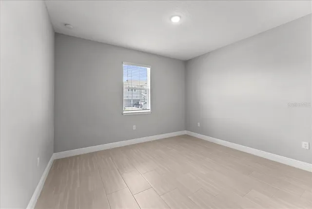 an empty room with a window