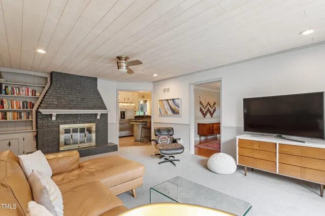 a view of workspace with furniture and staircase