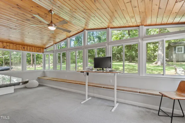 a dining room table chair and a chandelier