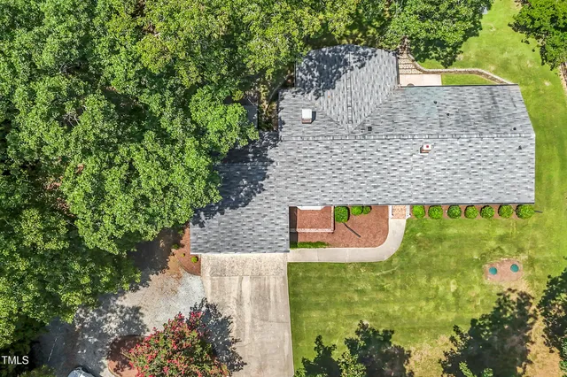 a kitchen with stainless steel appliances a refrigerator stove microwave and cabinets