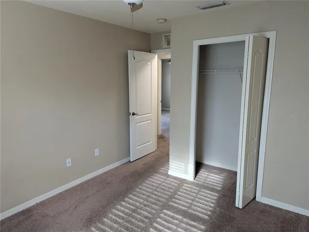 an empty room with closet