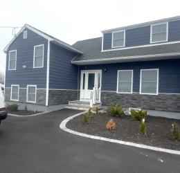 View of front facade with stone siding