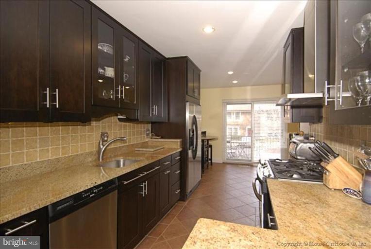 2137 Golf Course Drive Reston, VA 20191 - Photo 2 of 26 a bathroom with a sink double vanity