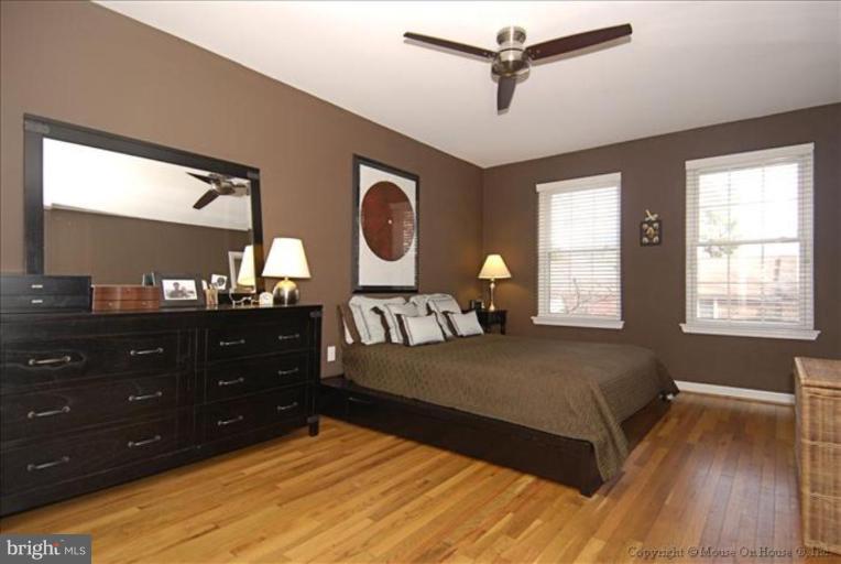 2137 Golf Course Drive Reston, VA 20191 - Photo 11 of 26 a bedroom with a bed and a window