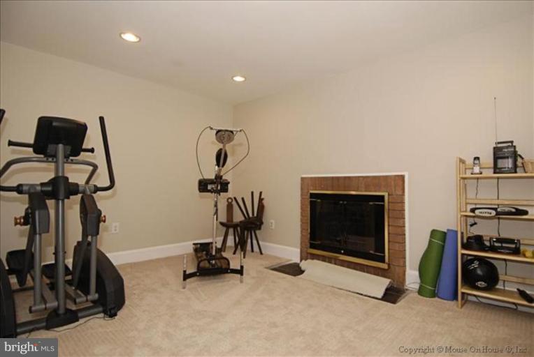 2137 Golf Course Drive Reston, VA 20191 - Photo 16 of 26 a view of a room with gym equipment