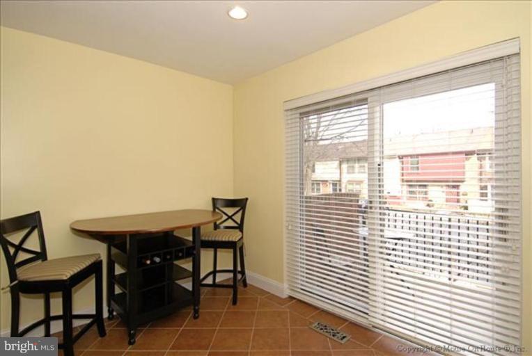 2137 Golf Course Drive Reston, VA 20191 - Photo 3 of 26 a view of a workspace with furniture