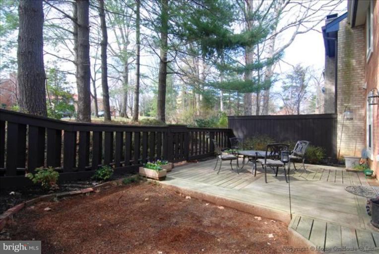 2137 Golf Course Drive Reston, VA 20191 - Photo 25 of 26 a view of a chairs and tables in patio