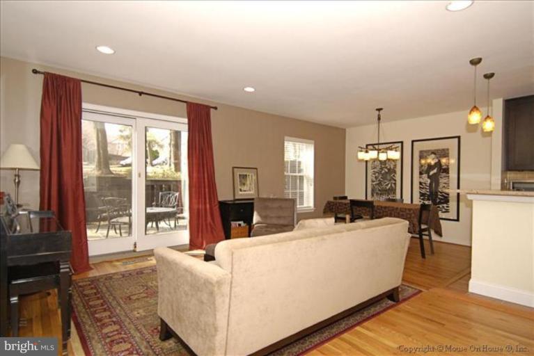 2137 Golf Course Drive Reston, VA 20191 - Photo 8 of 26 a living room with furniture and a large window